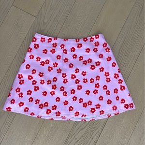 Small pink and red flower print skirt great for a themed party or just to wear!